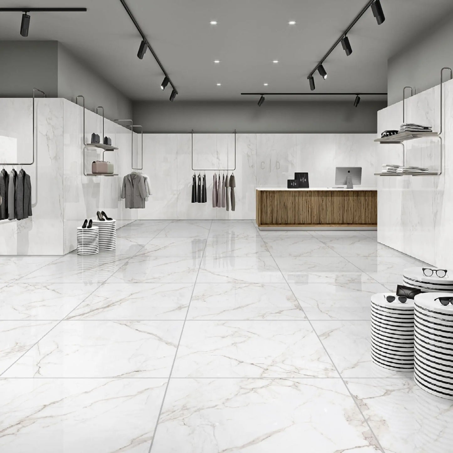 Pavimento cerâmico Calacatta Supremo aplicado no chão de uma loja de roupa moderna e espaçosa.