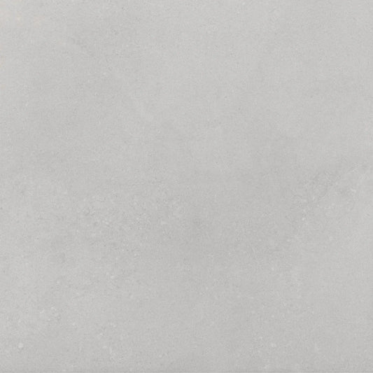 Ladrilho de pavimento cerâmico quadrado Cosy Grey com textura de efeito cimento em tom de cinza claro.