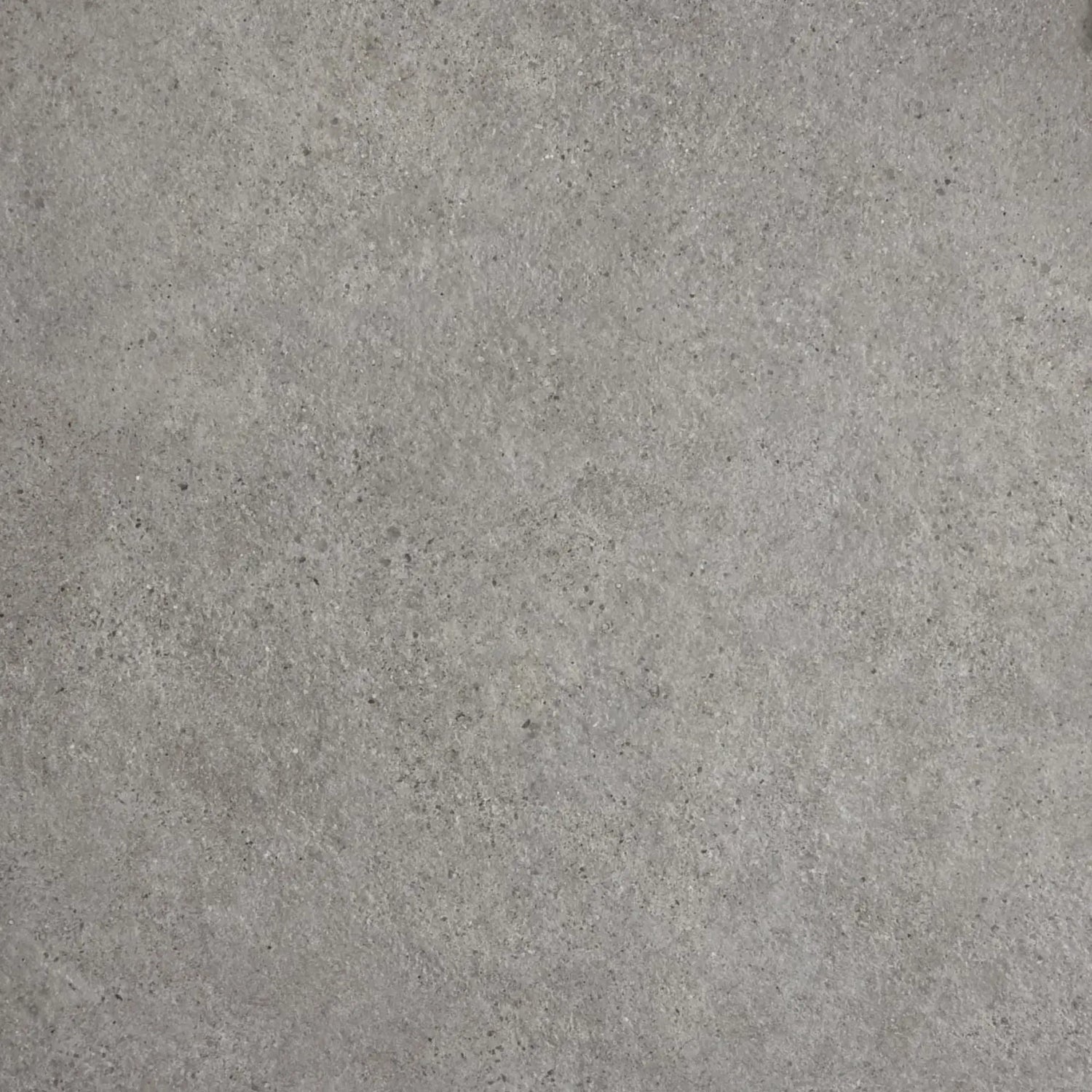 Pavimento cerâmico cinza UNDERGROUND Silver com acabamento de efeito cimento natural.